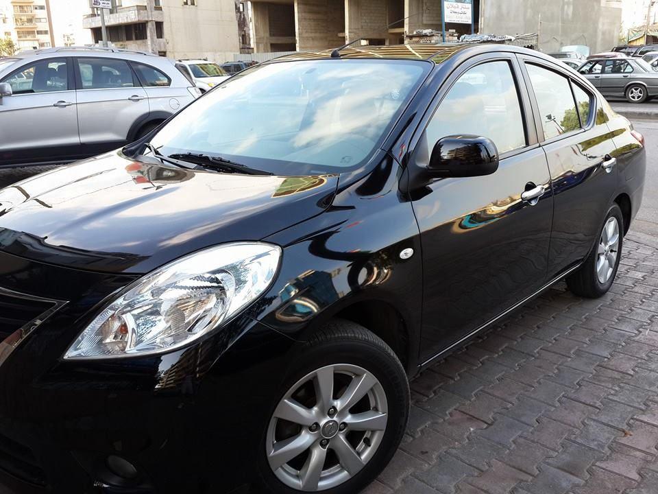 Nissan sunny 2013 full option for sale  comfortable condition, 